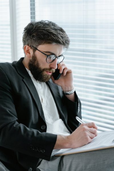 man-in-black-suit-jacket-wearing-black-framed-eyeglasses-7567553-683x1024